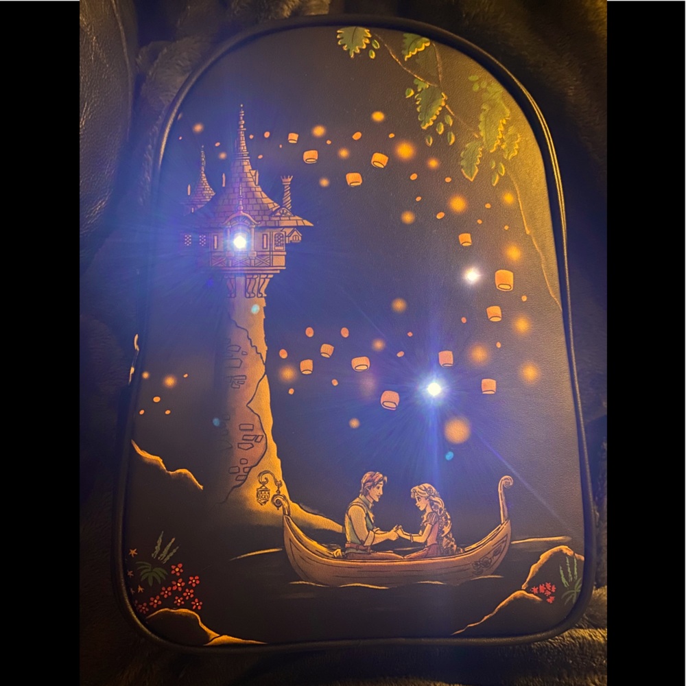 Tangled Loungefly mini backpack that lights up.